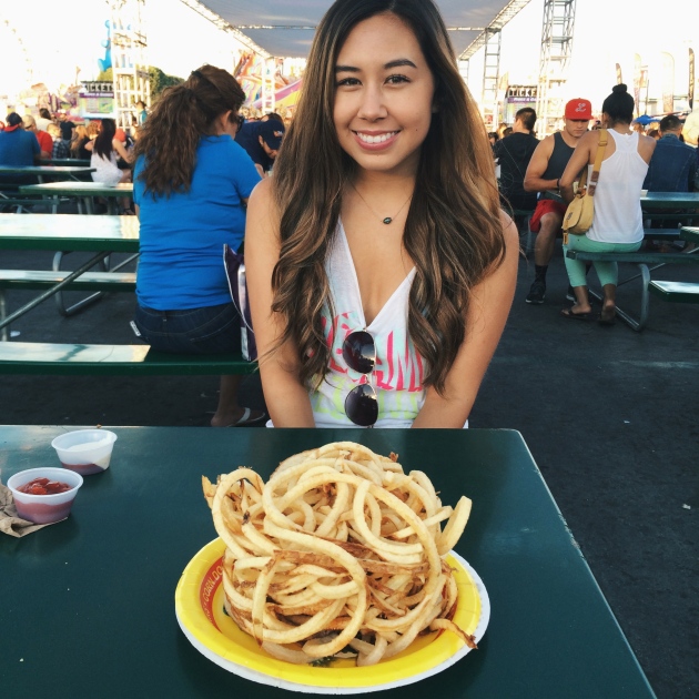 Eating curly fries at the OC Fair